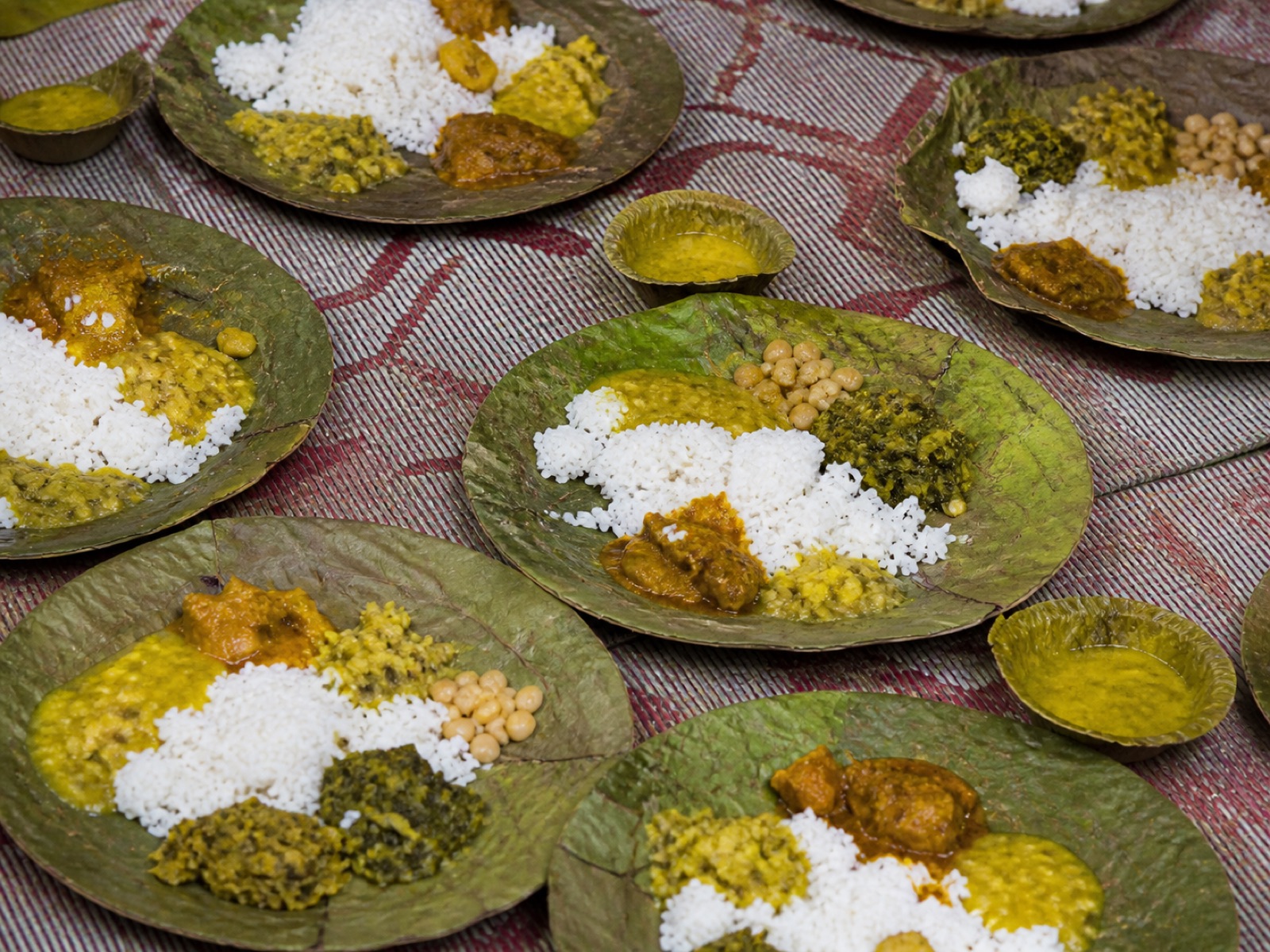 A Himachali dham meal served with rice and several dishes