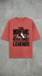 The Mountains Never Forget Their Legends – Vintage Mountain Graphic T-Shirt